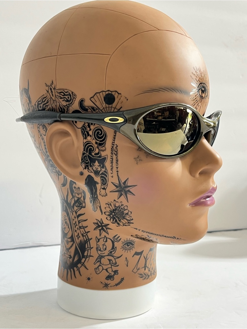 Oakley Metallic bronze Frame Sunglasses with Gold Mirrored Lenses